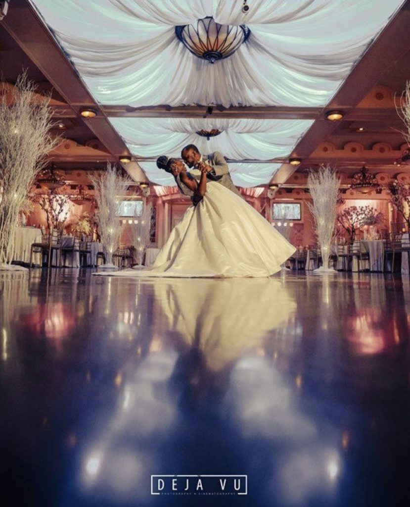 a bride and groom photo as they're dancing