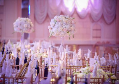 flower centerpieces on wedding hall table