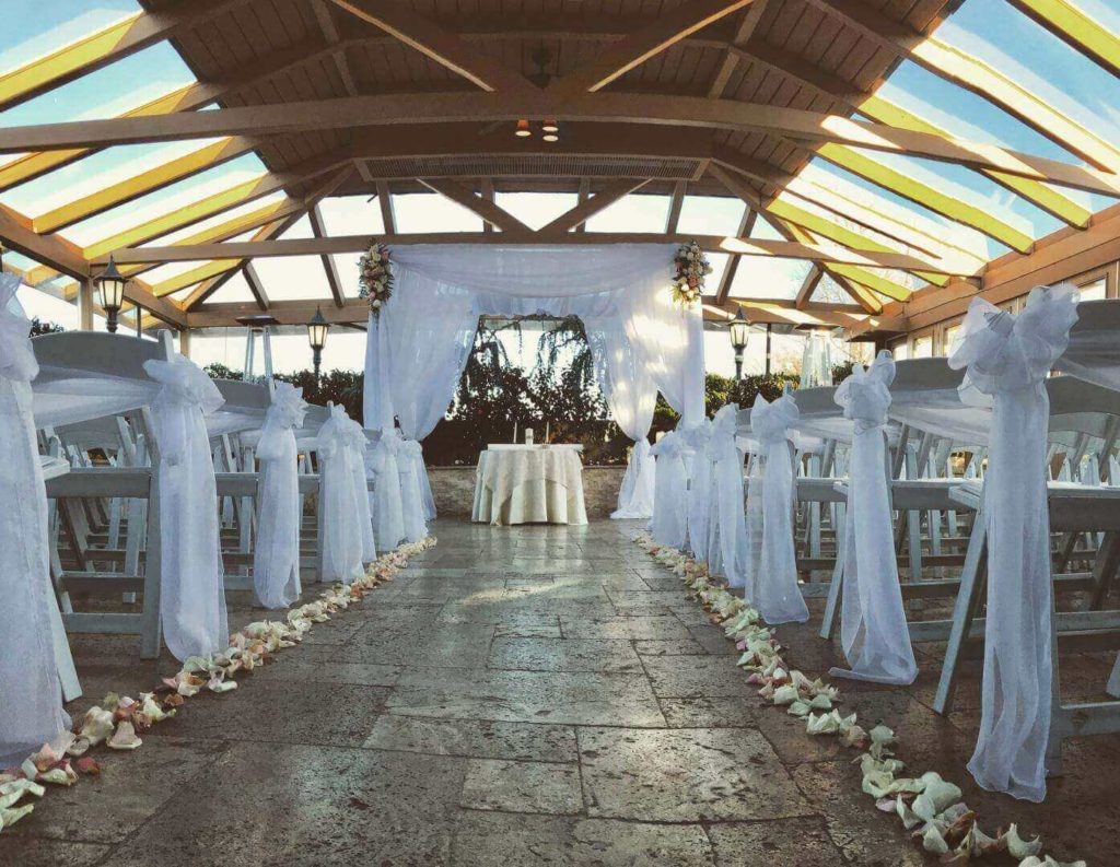 Outdoor Wedding Setting With White Decorations